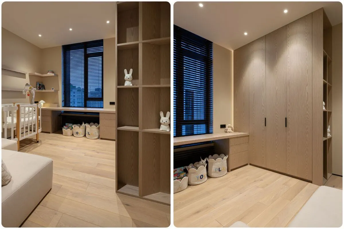 Дитяча кімната у стилі мінімалізм: біле дитяче ліжечко, шафи з фасадами із МДФ-панелей, паркет, світлий диван